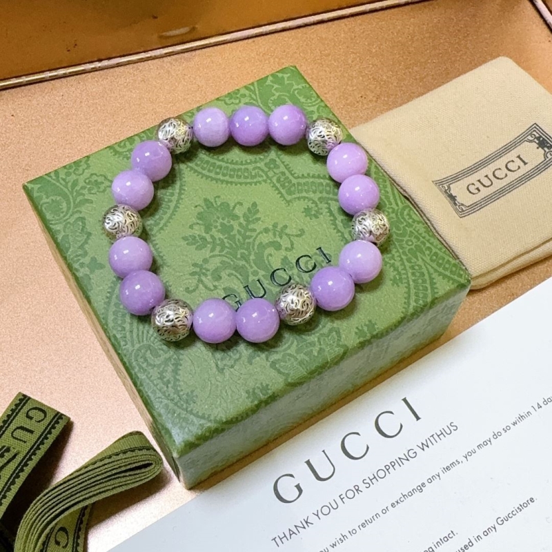 G*u*i bracelets
